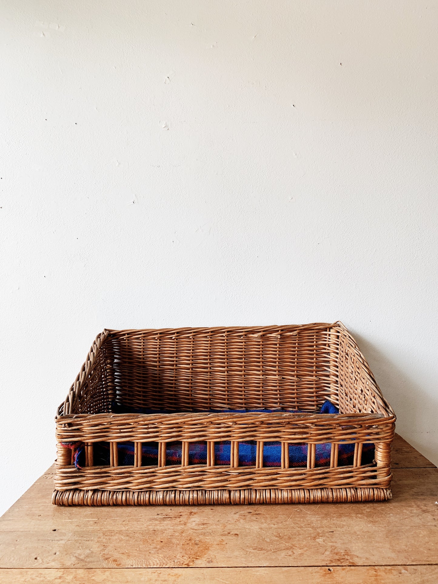 Wicker Animal Bed with Plaid Wool Blanket