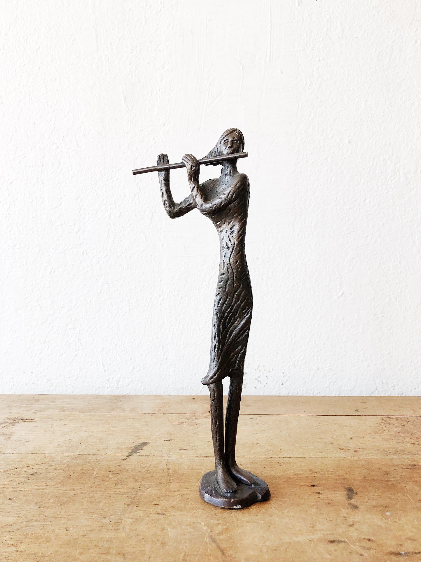 Cast Iron Flutist