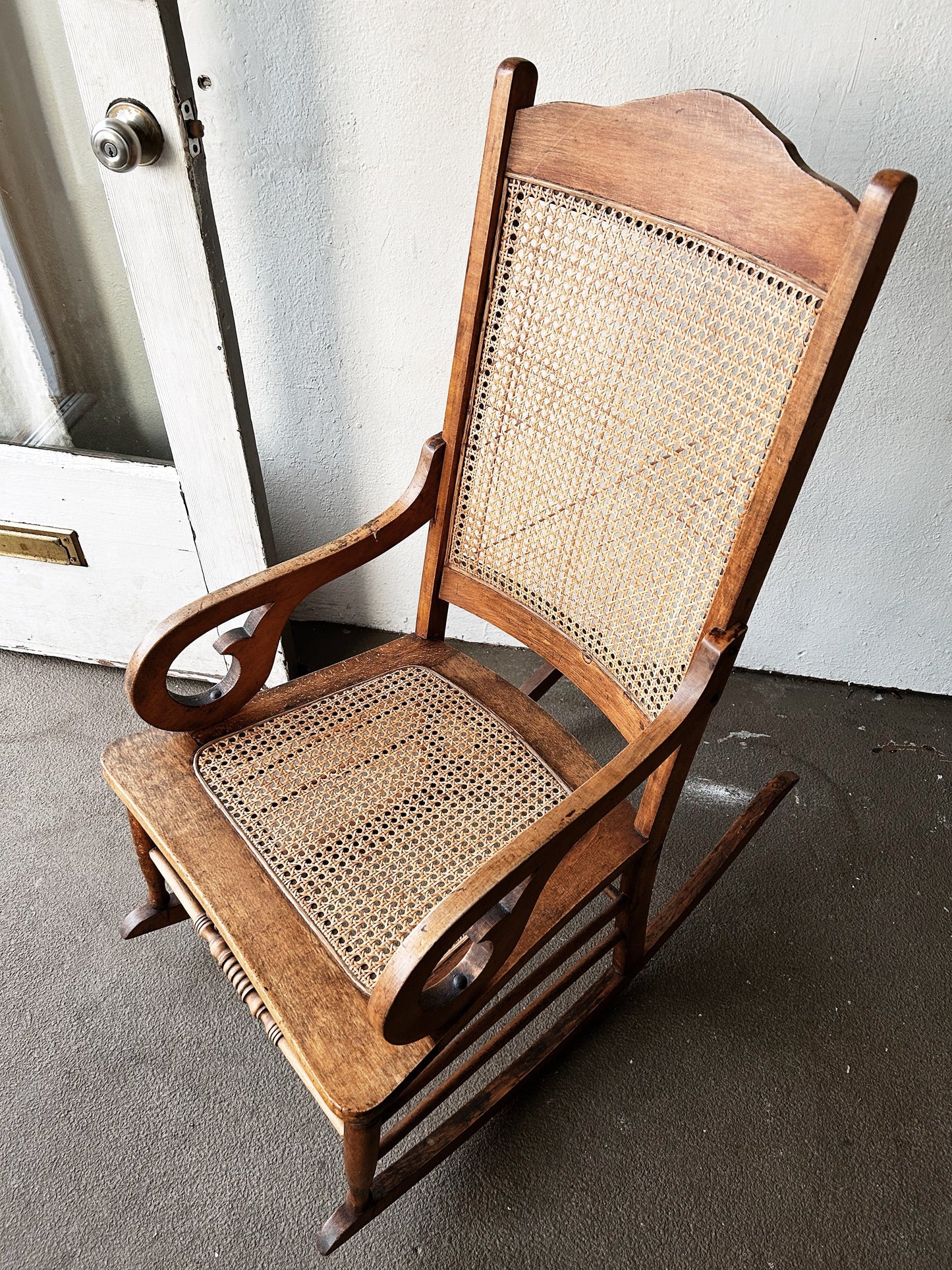 Antique Mahogany Caned Rocker