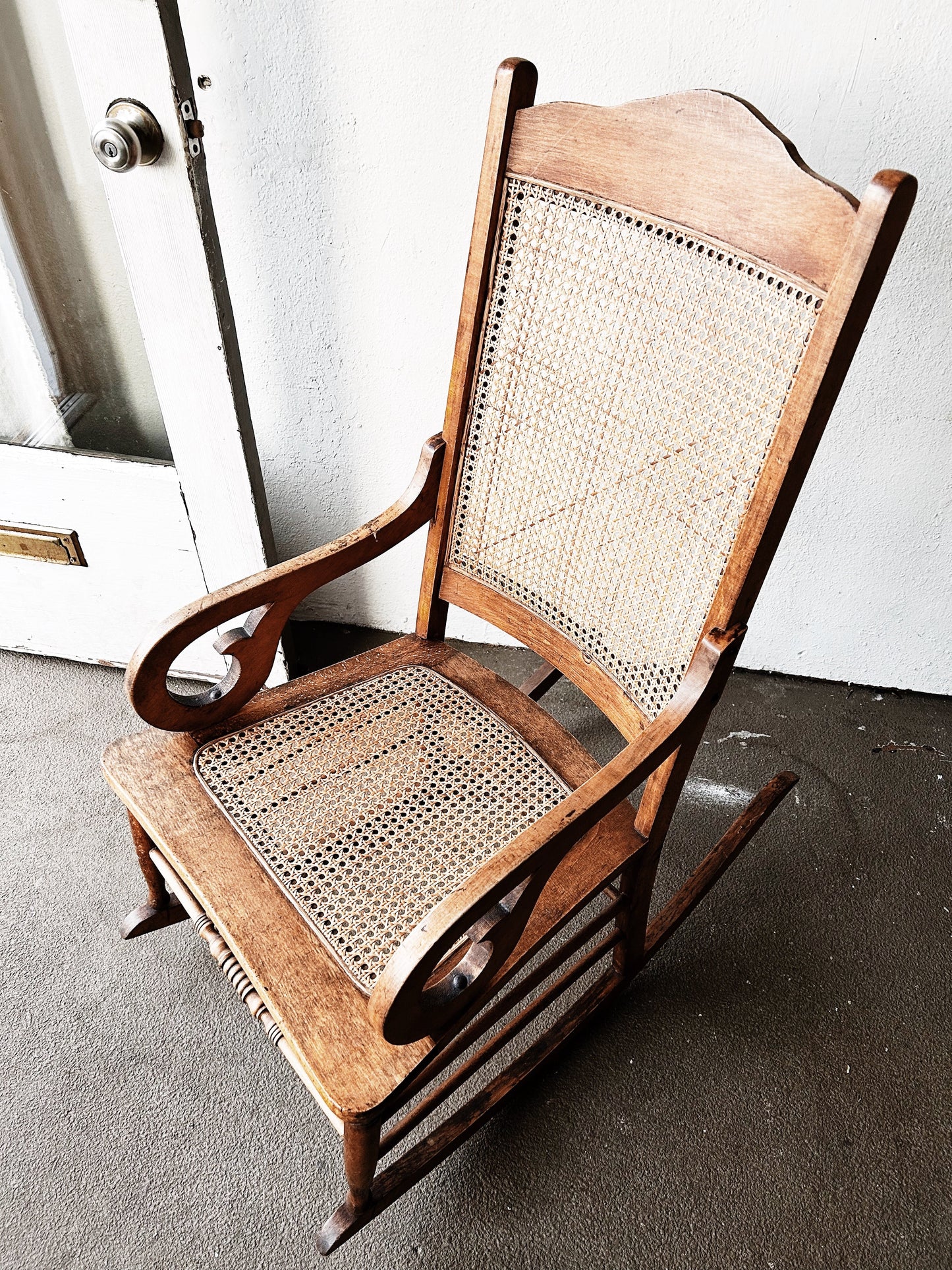 Antique Mahogany Caned Rocker