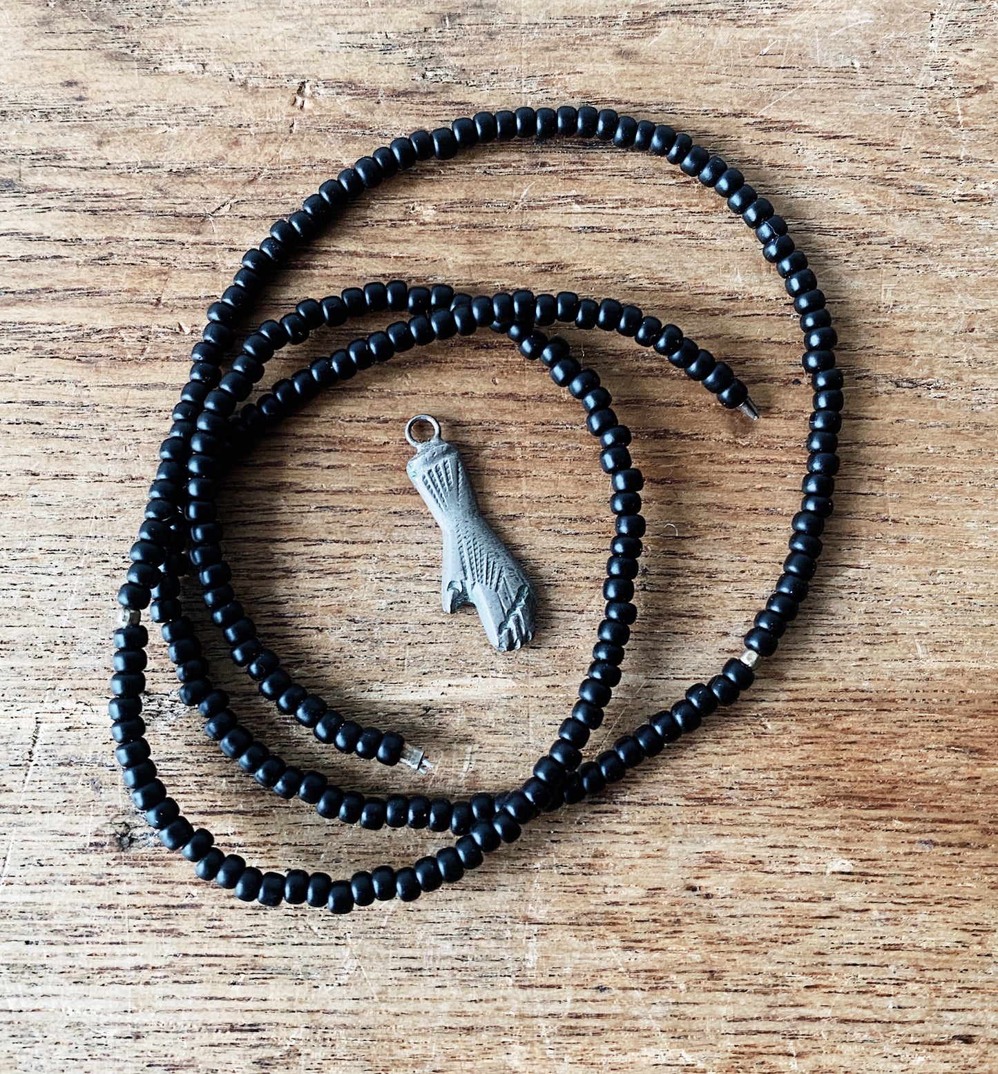 Black Seed Beads and Hand Milagro
