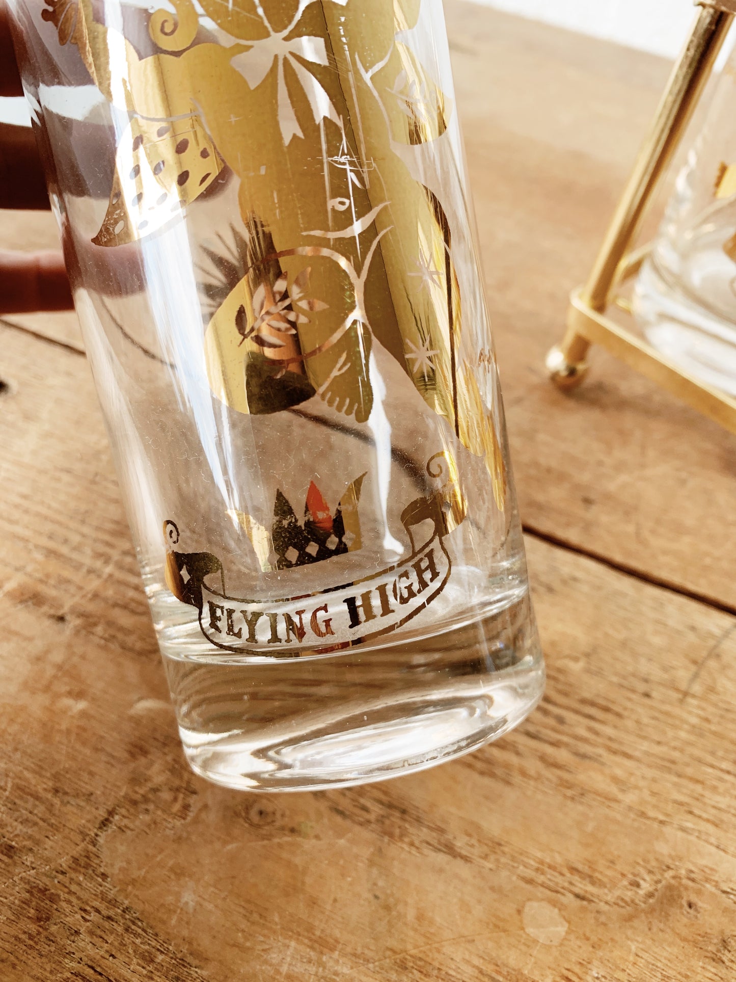 Mid century Georges Briard Set of Eight Gold Foil High Ball Glasses with Holder