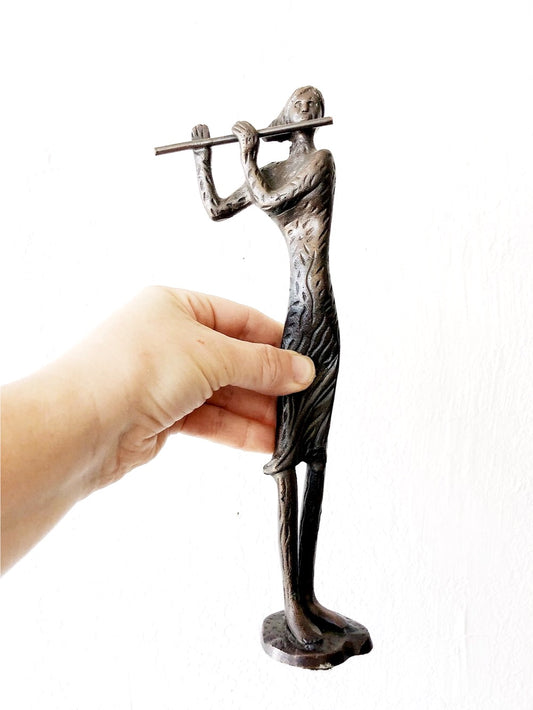Cast Iron Flutist
