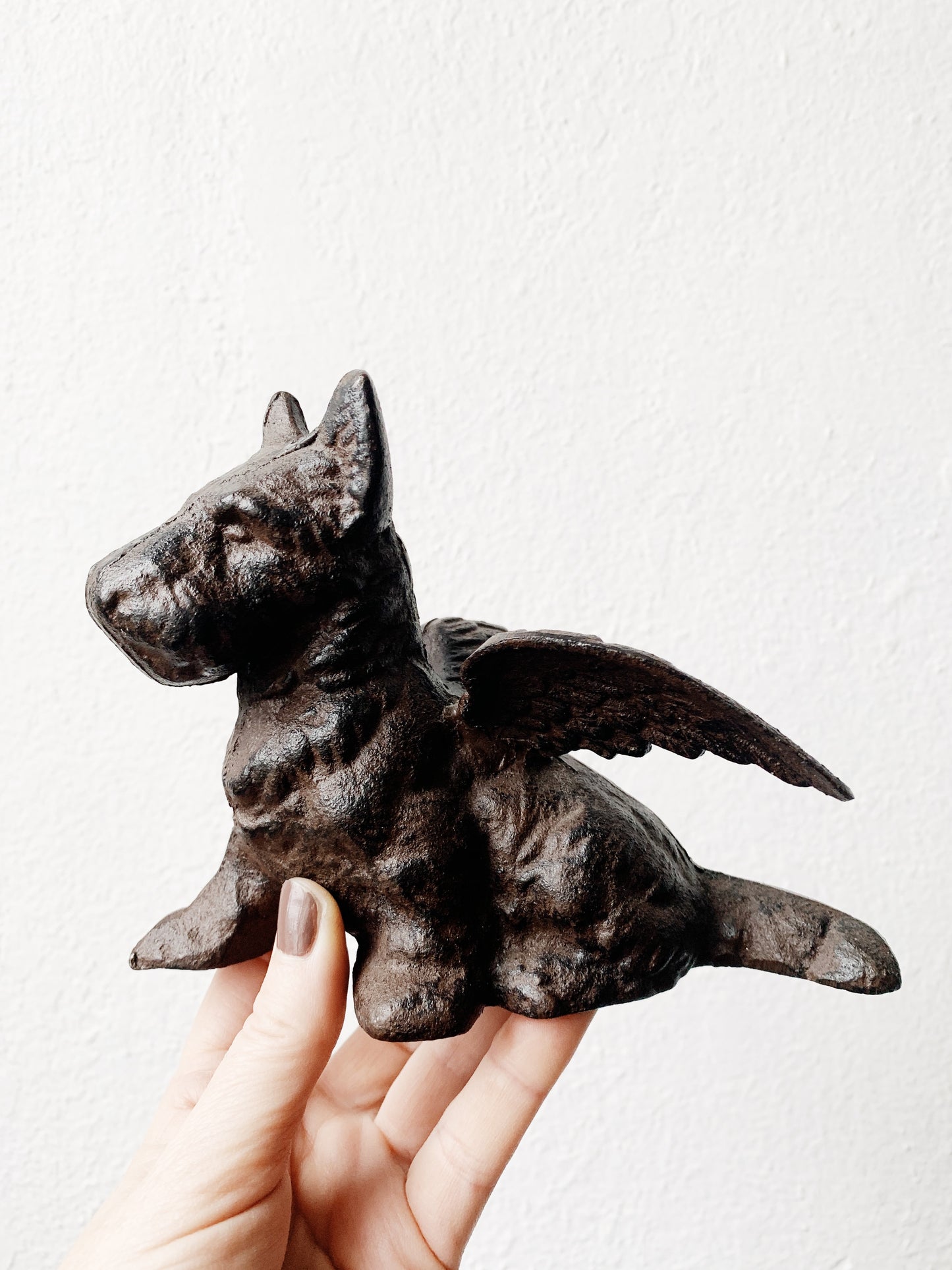 Weighty Cast Iron Winged Scotty