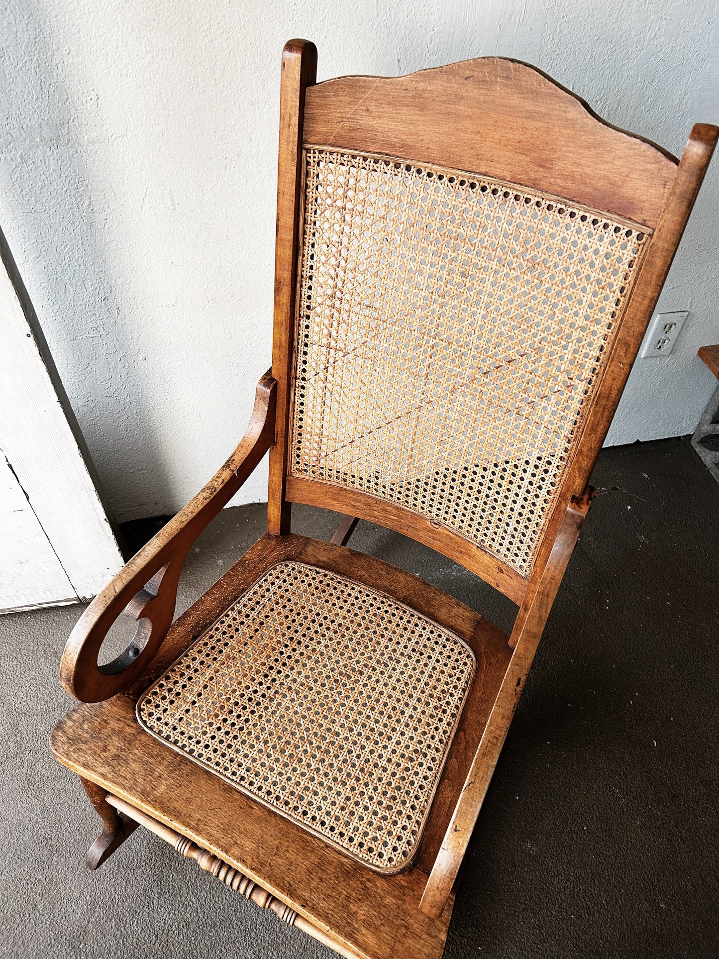 Antique Mahogany Caned Rocker