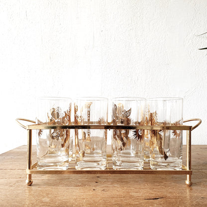 Mid century Georges Briard Set of Eight Gold Foil High Ball Glasses with Holder