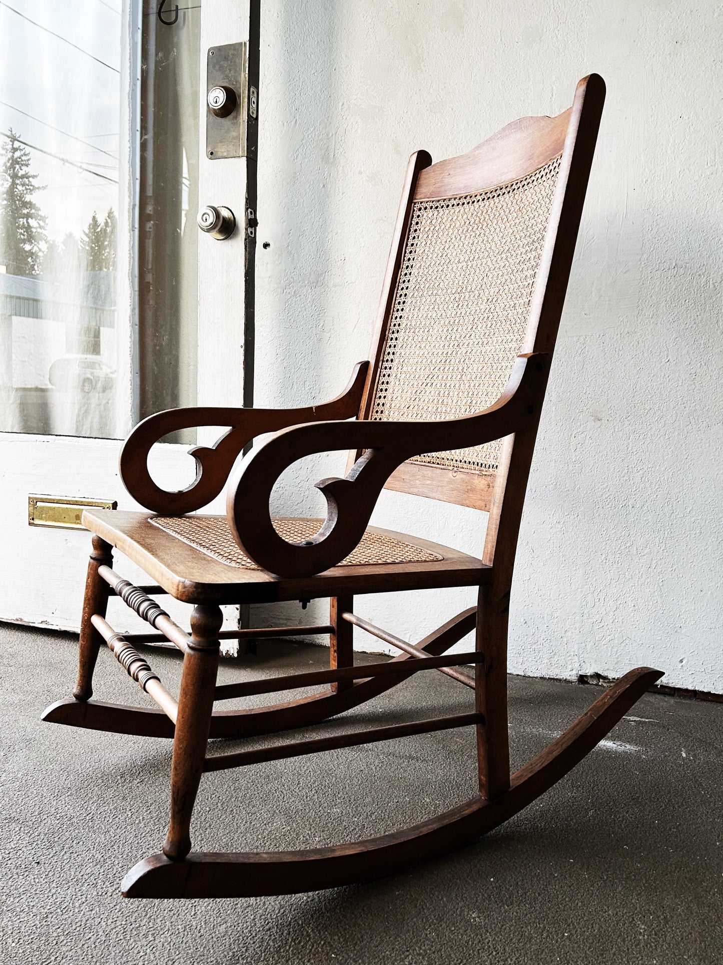 Antique Mahogany Caned Rocker