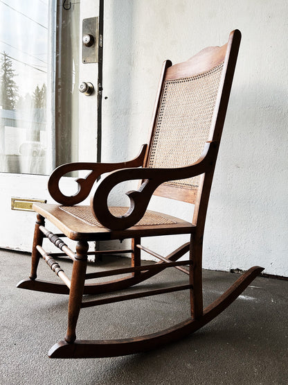 Antique Mahogany Caned Rocker