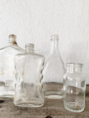 Vintage Glass Bottle Collection with Bamboo Tray