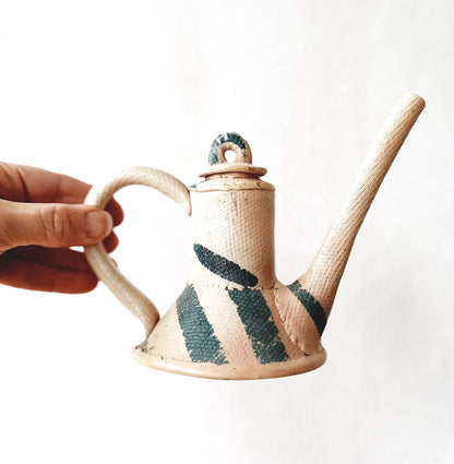 Slab Built Oil Pourer