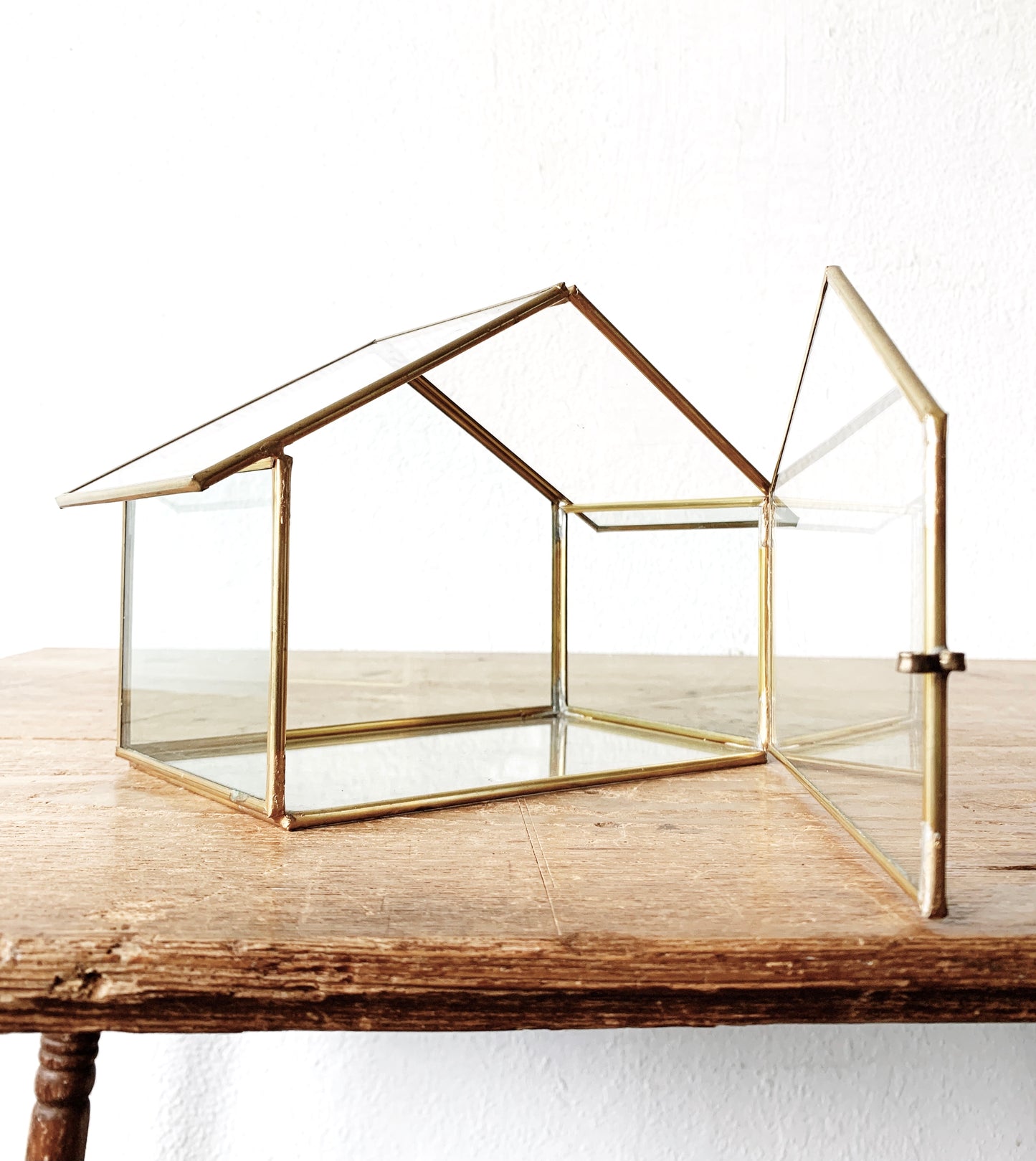 Brass and Glass House