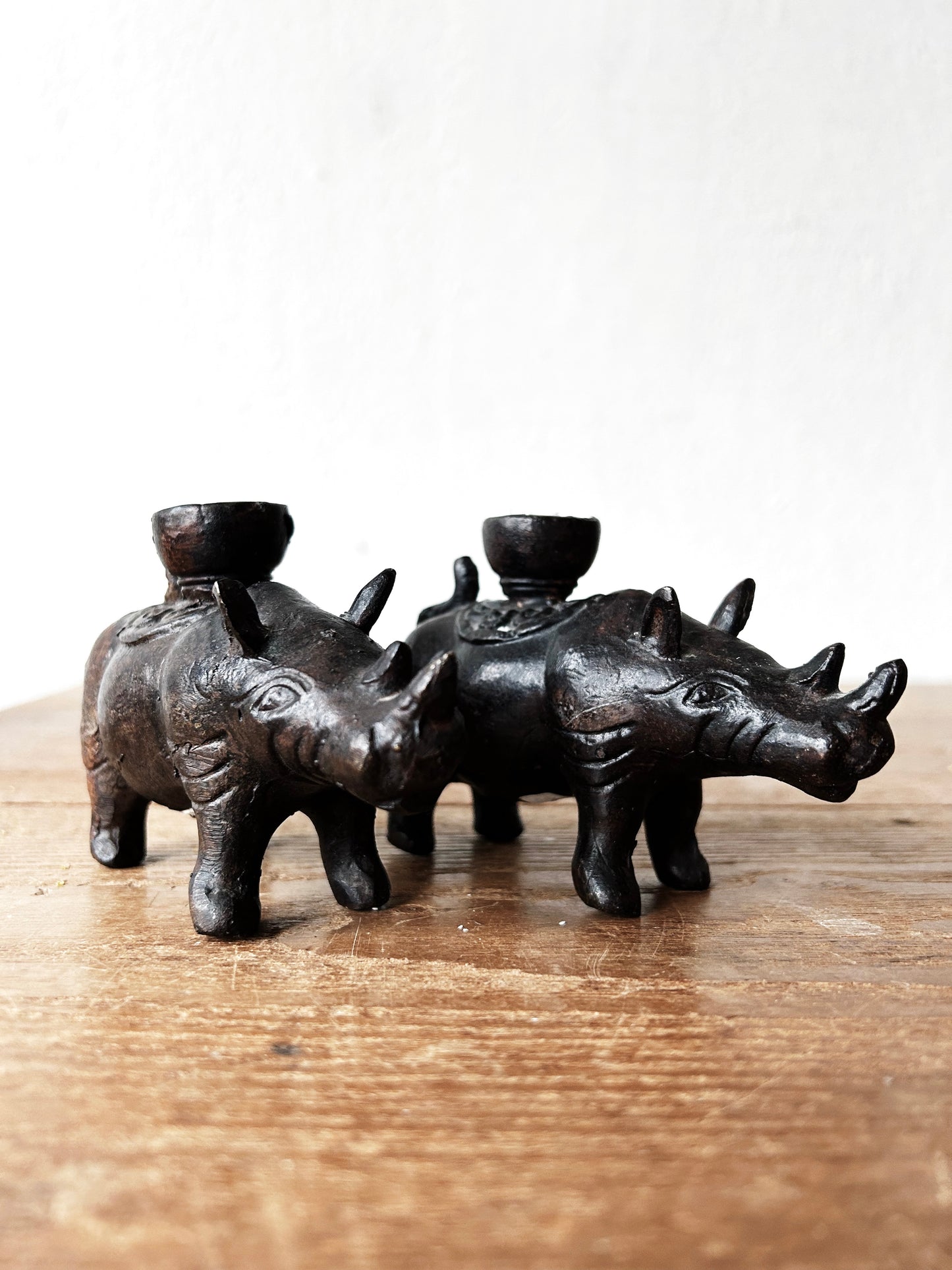 Vintage Pair of Indonesian Cast Iron Rhinoceros Candle Holders
