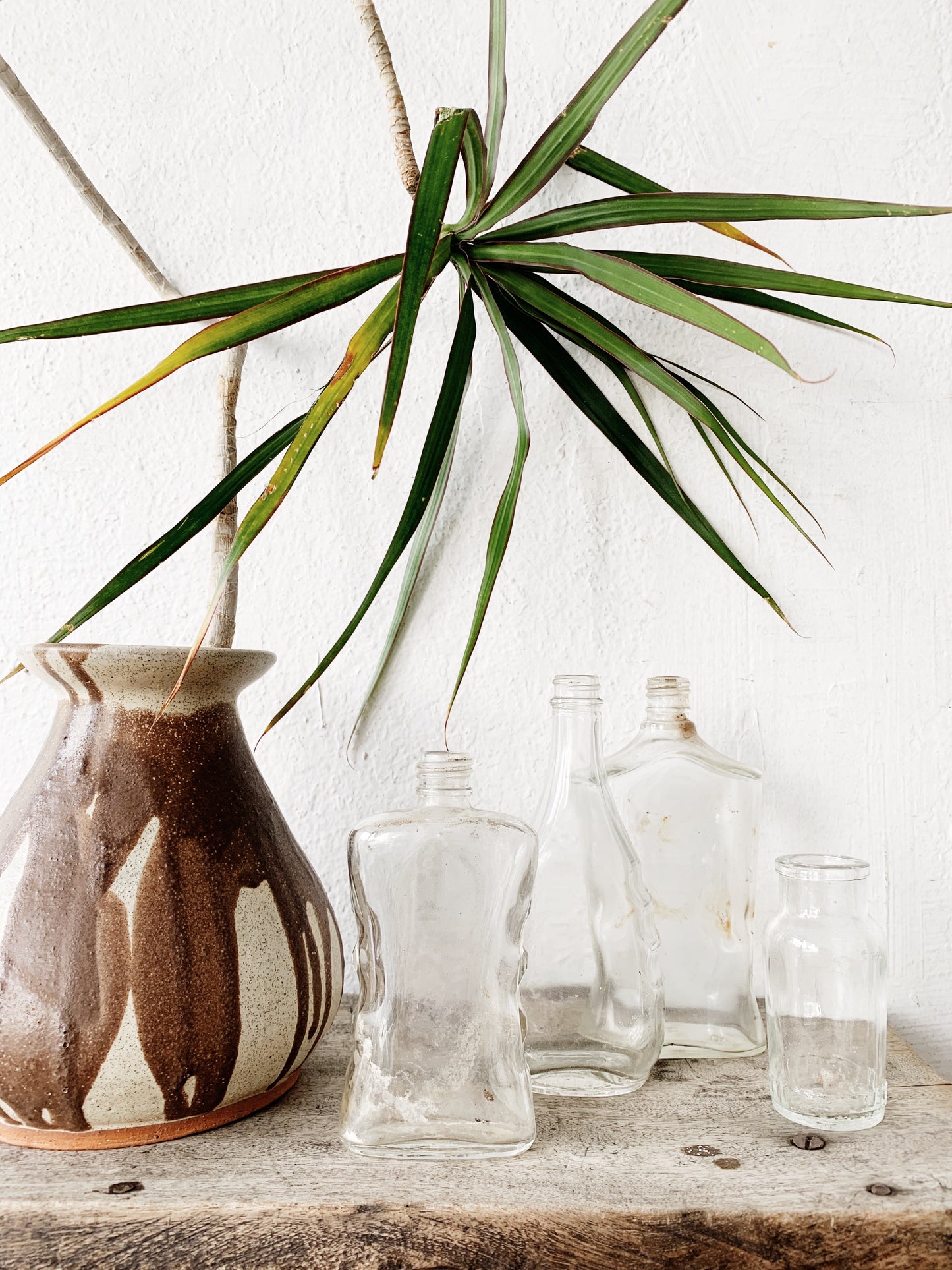 Vintage Glass Bottle Collection with Bamboo Tray
