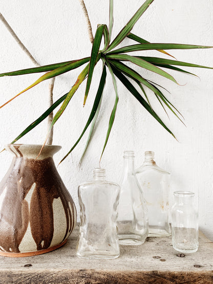 Vintage Glass Bottle Collection with Bamboo Tray