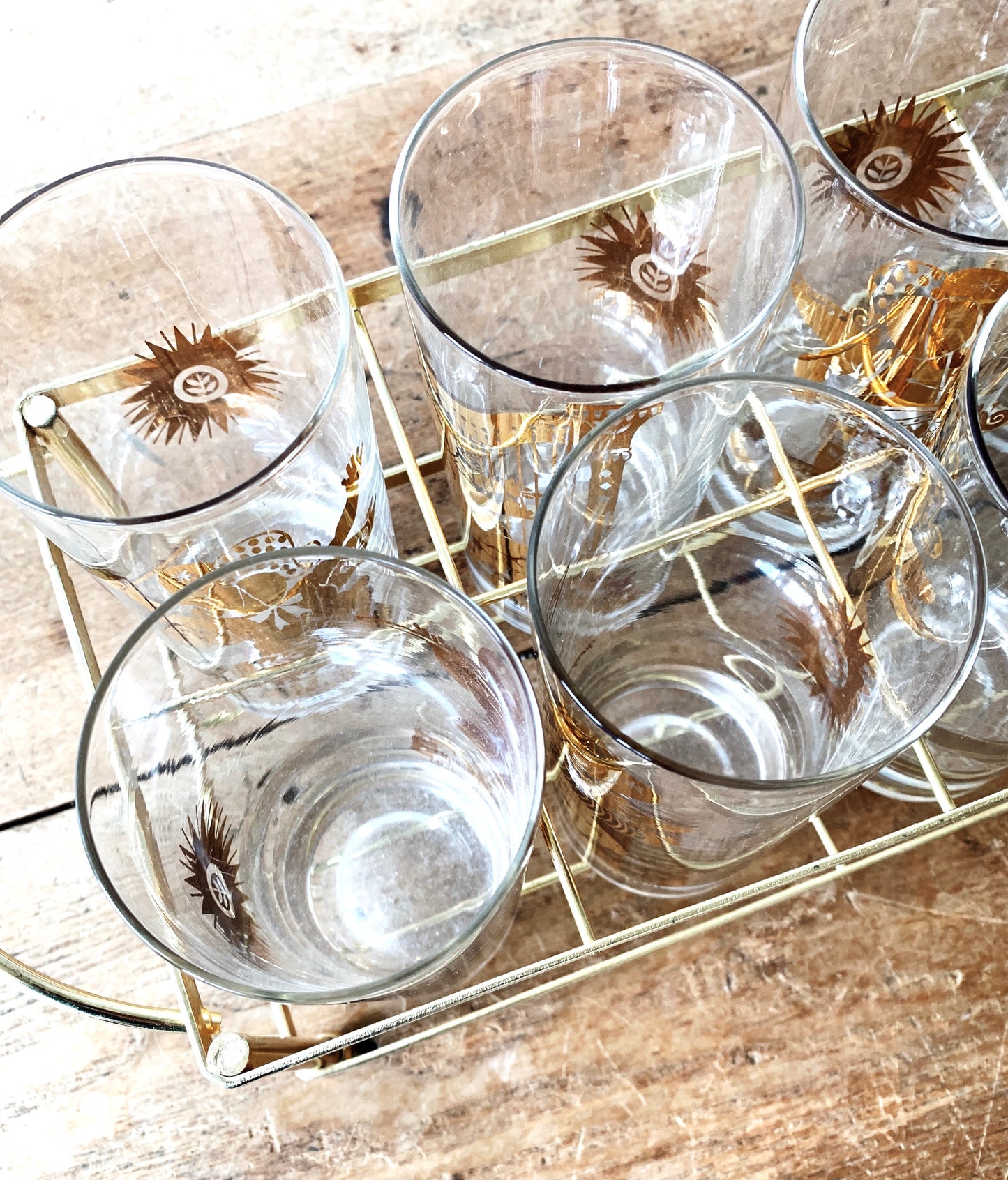 Mid century Georges Briard Set of Eight Gold Foil High Ball Glasses with Holder