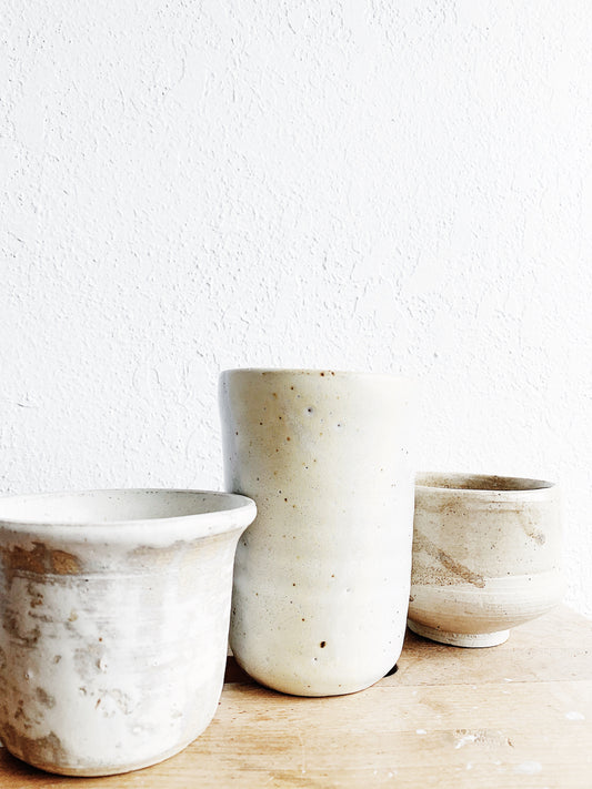 A Trio of Creamy White Pottery